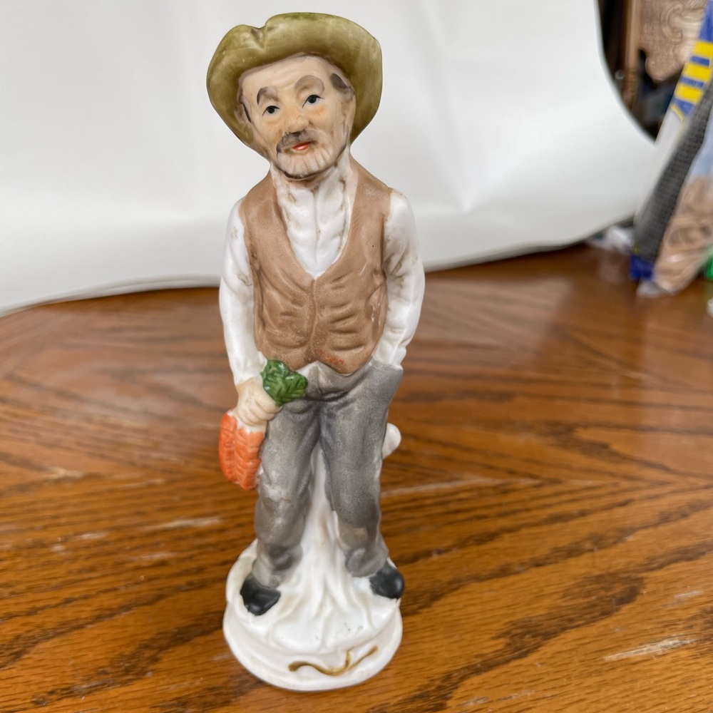 Vintage Crown Deville ceramic man figurine.